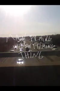 Man Filming Woman Filming Thing