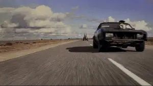 Задник до фильму"Скажений Макс: Воїн дороги" #806378