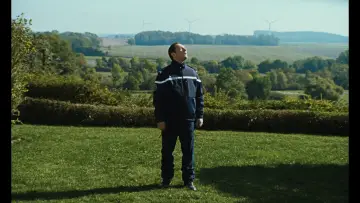 Задник до фільму "L