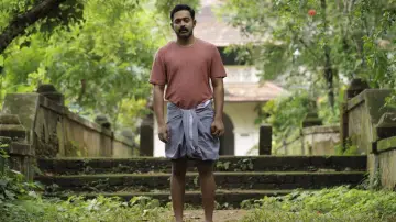 Задник до фильму"കിഷ്കിന്ധാ കാണ്ഡം" #923212