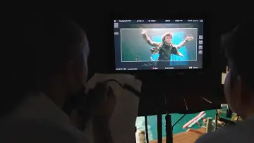 Задник до фильму"A Hero