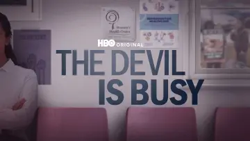 Задник до фильму"The Devil Is Busy" #618099