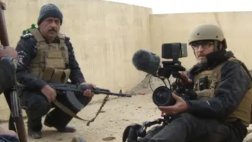 Задник до фільму "Armed Only with a Camera: The Life and Death of Brent Renaud" #618493