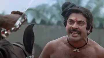 Задник до фильму"ഒരു വടക്കൻ വീരഗാഥ" #1163104