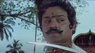 Задник до фильму"ഒരു വടക്കൻ വീരഗാഥ" #1163107