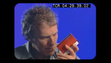 Задник до фільму "T
