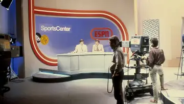 Задник до фильму"Sports Heaven: The Birth of ESPN" #792105
