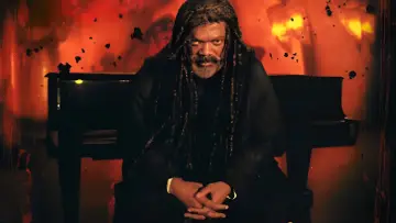 Задник до фильму"The Caveman