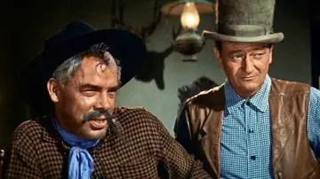 Задник до фильму"The Comancheros" #357004