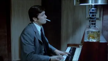 Задник до фильму"Un flic" #452663