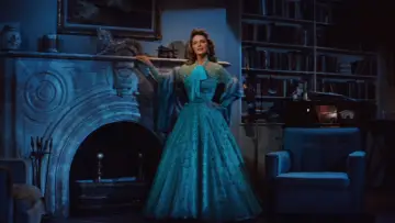 Задник до фільму "The Girl Can