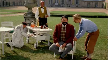 Задник до фильму"Tintin et le Mystère de la Toison d