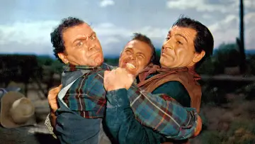 Задник до фильму"The Badlanders" #498235