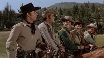 Задник до фильму"Kansas Raiders" #497512