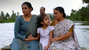 Задник до фильму"ഉള്ളൊഴുക്ക്" #1120819