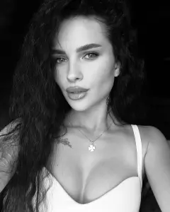 Аміна Каіра