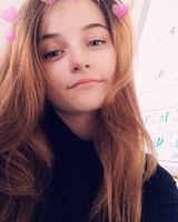 Оля Махлай