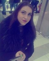 Оля Левченко